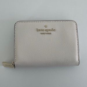 Kate Spade “Darcy small zip around card case wallet”